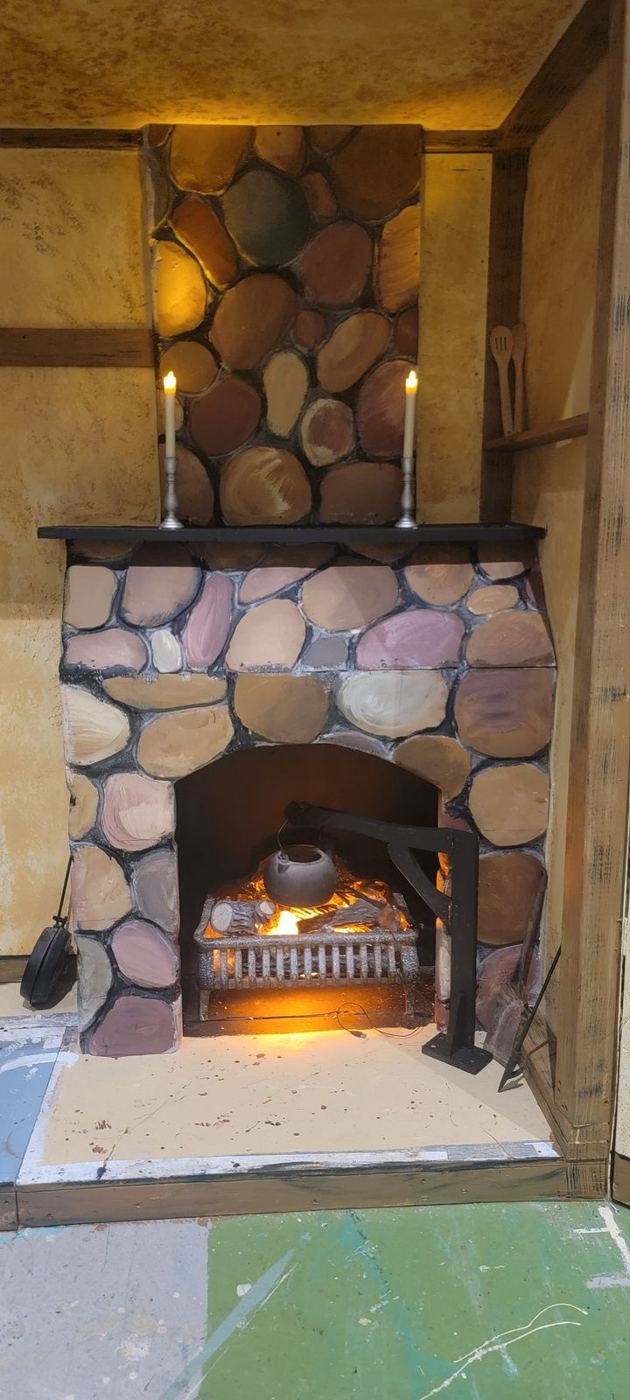 The finished fireplace, lit