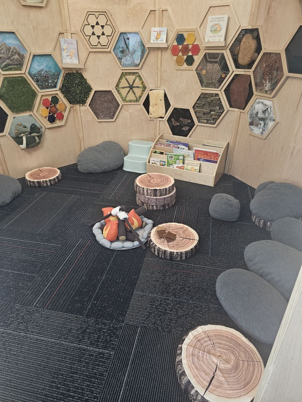 The finished Quiet Fort reading nook and hex wall